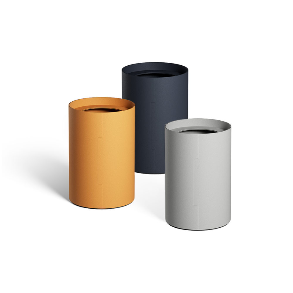 Three TIDY Paper Bins designed by Keiji Takeuchi in Leather Carbon and Ash shades of linoleum.