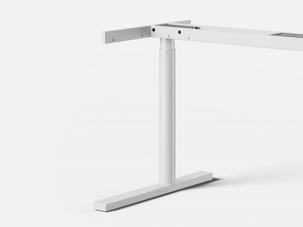 Detailed view of the ATS height-adjustable table frame with white round steel column.